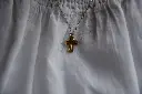 Christian cross pendant plated in 18 carat gold