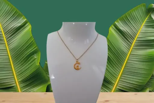 pendentif doré "lapin sous une étoile"